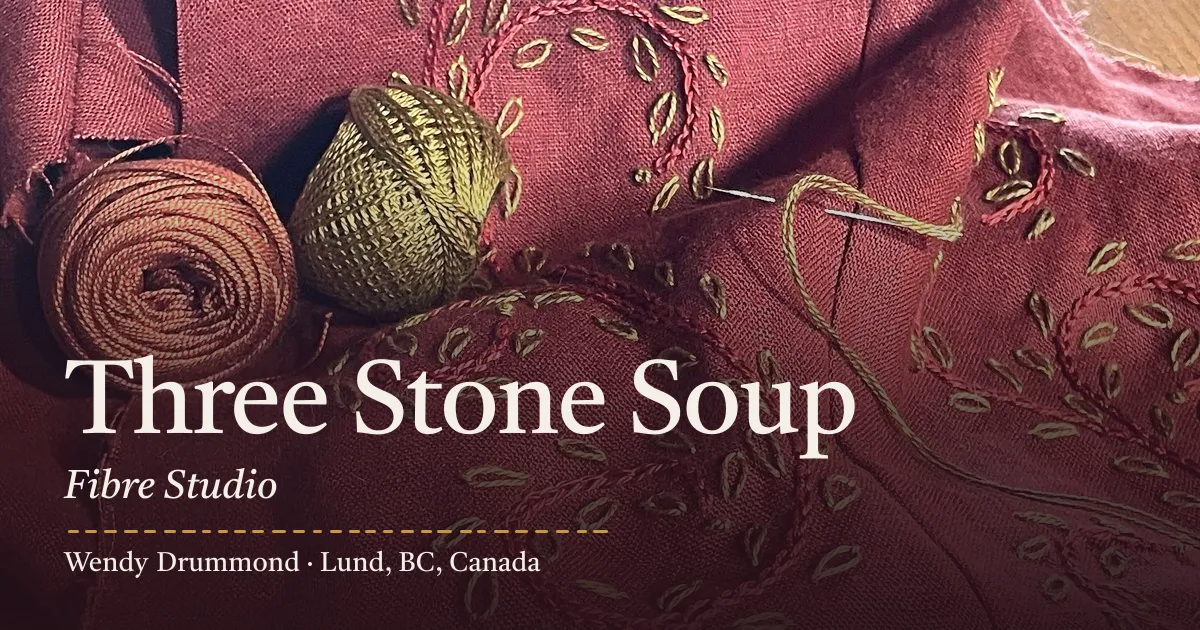 Three Stone Soup Fibre Studio, Wendy Drummond, Lund, BC, over her hand embroidery on plum linen